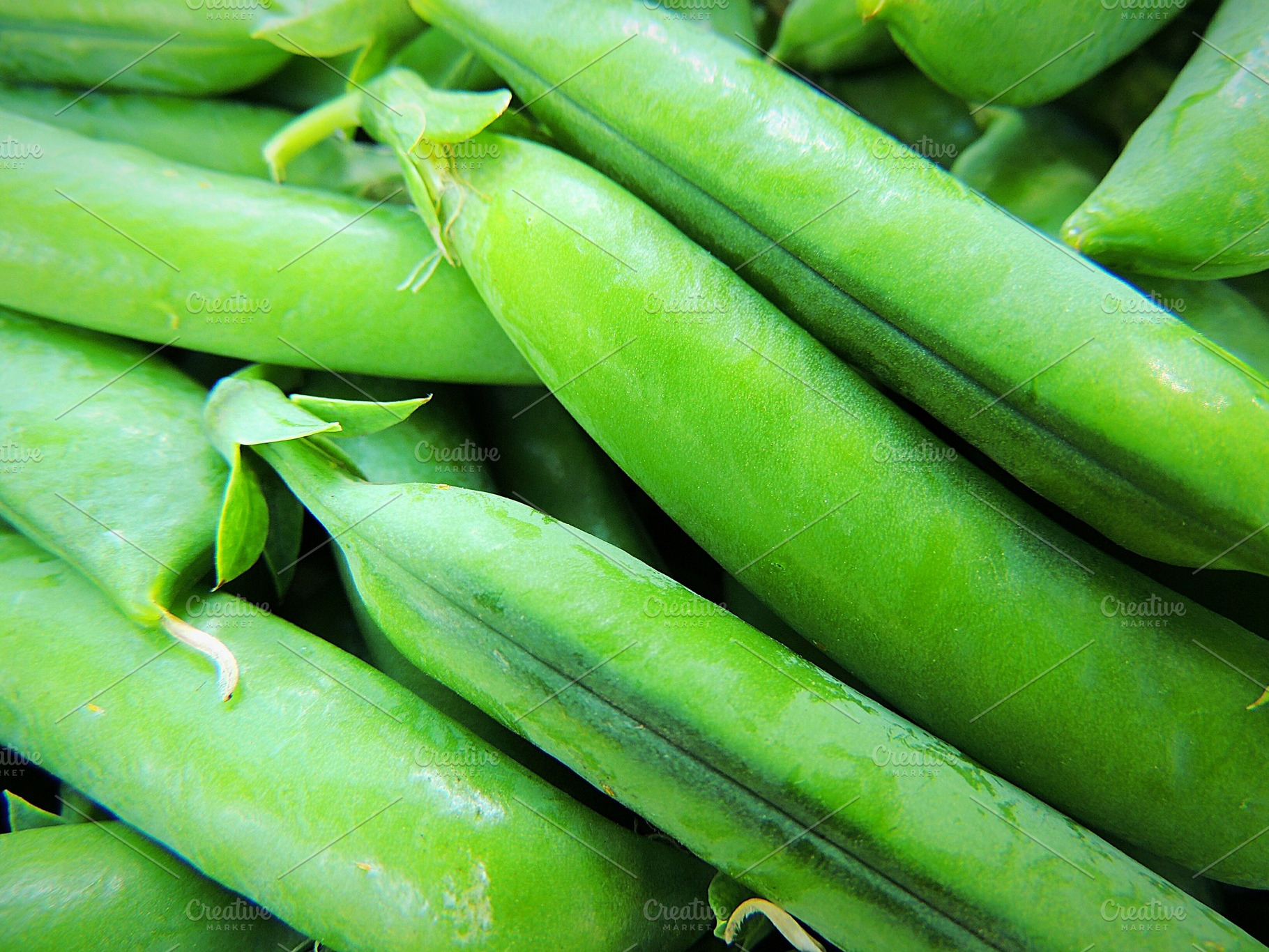 Pods of organic sweet peas., a Food & Drink Photo by OksanaAn