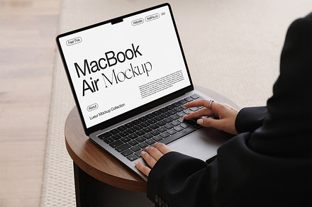 MacBook with Hands Mockup PSD, a Mac Mockup by Feel This