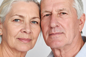 Couple senior portrait close with serious expressions, a Person Photo by GoodGoods