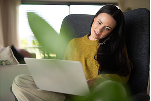 Female freelancer working from home, a Person Photo by HalfPoint