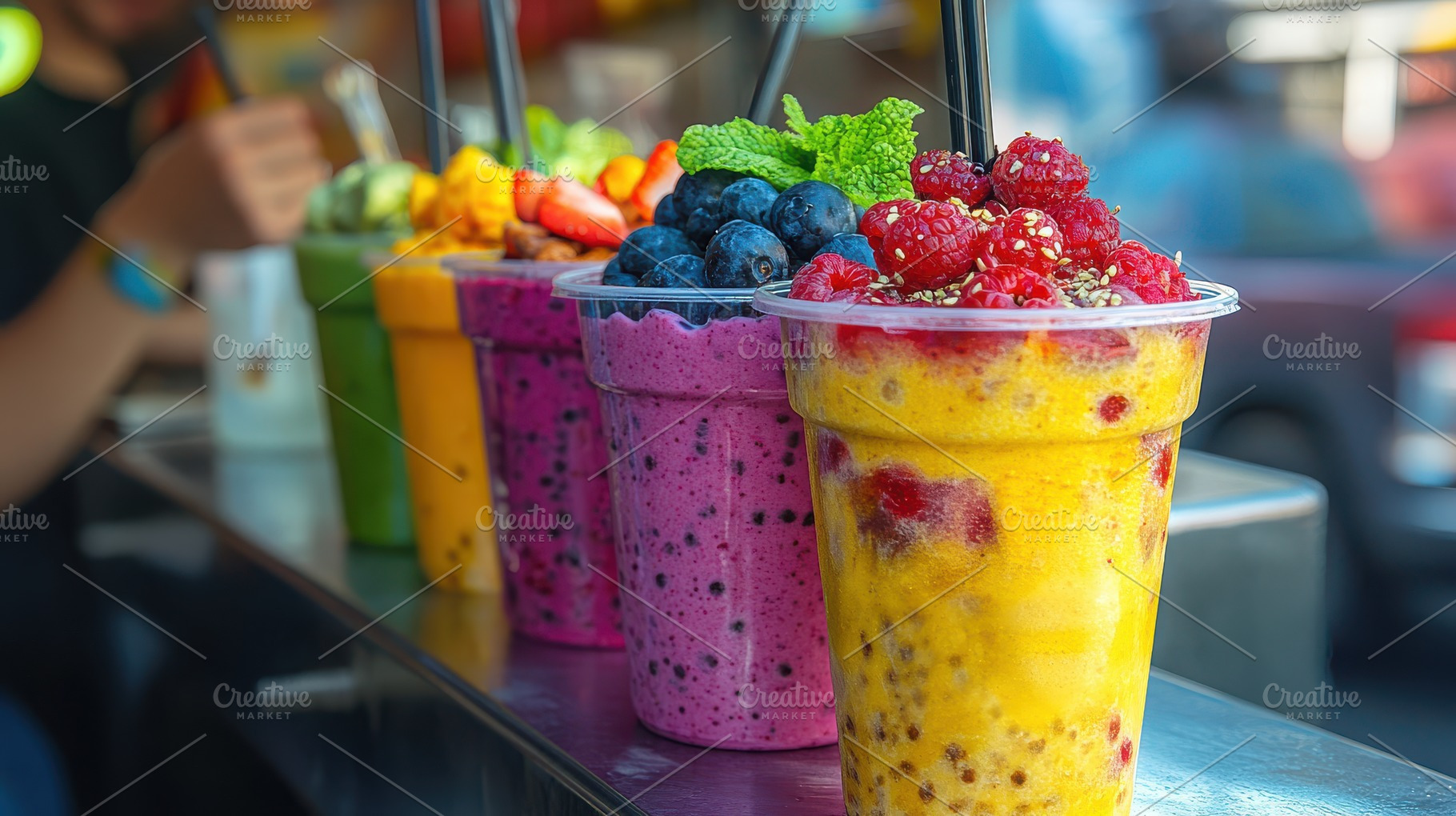 Colorful row of fruit smoothies on a, a Food & Drink Photo by Pixeness Studio