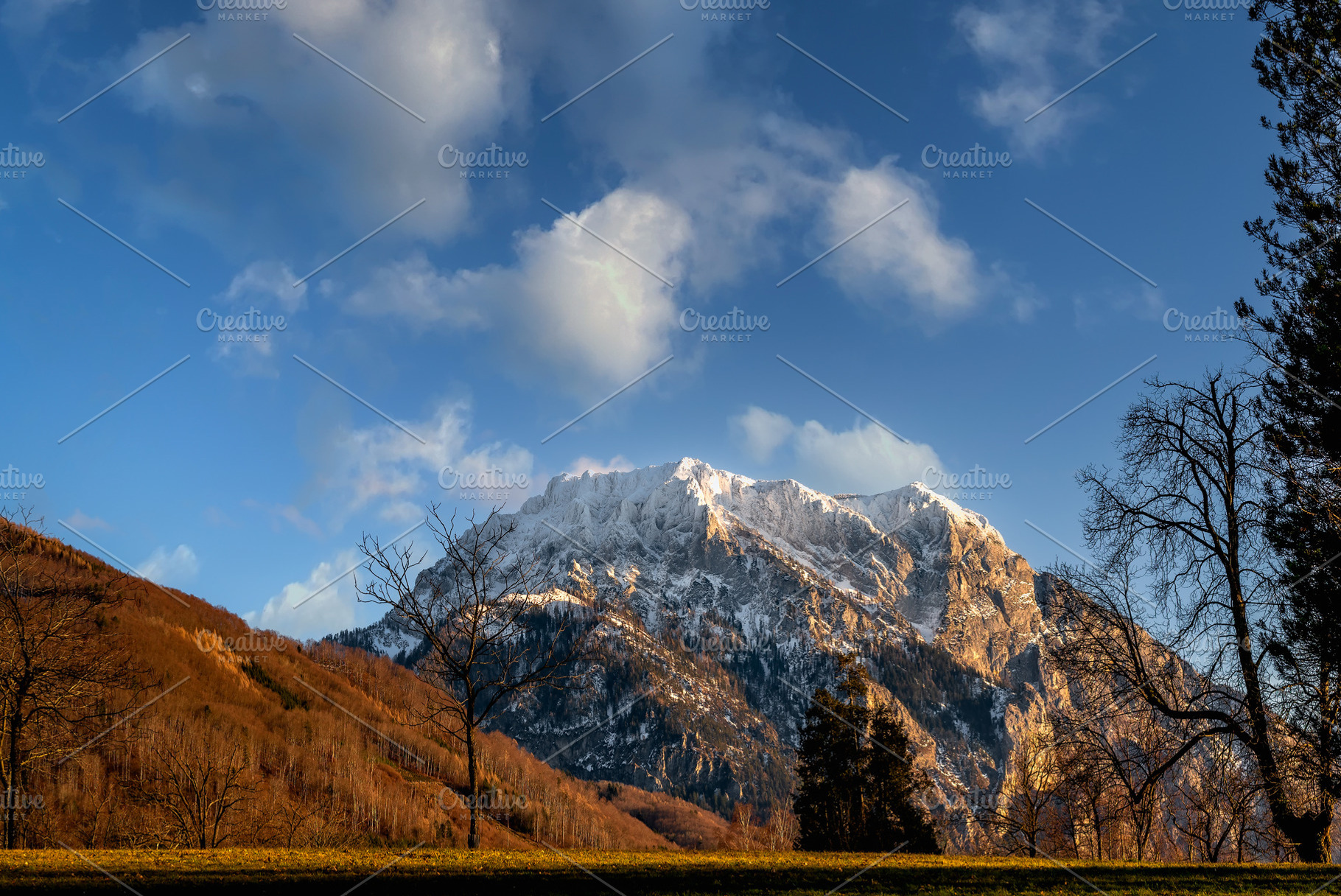 Sunset view of Traunkirchner Kogel, a Nature Photo by Millenn Photography