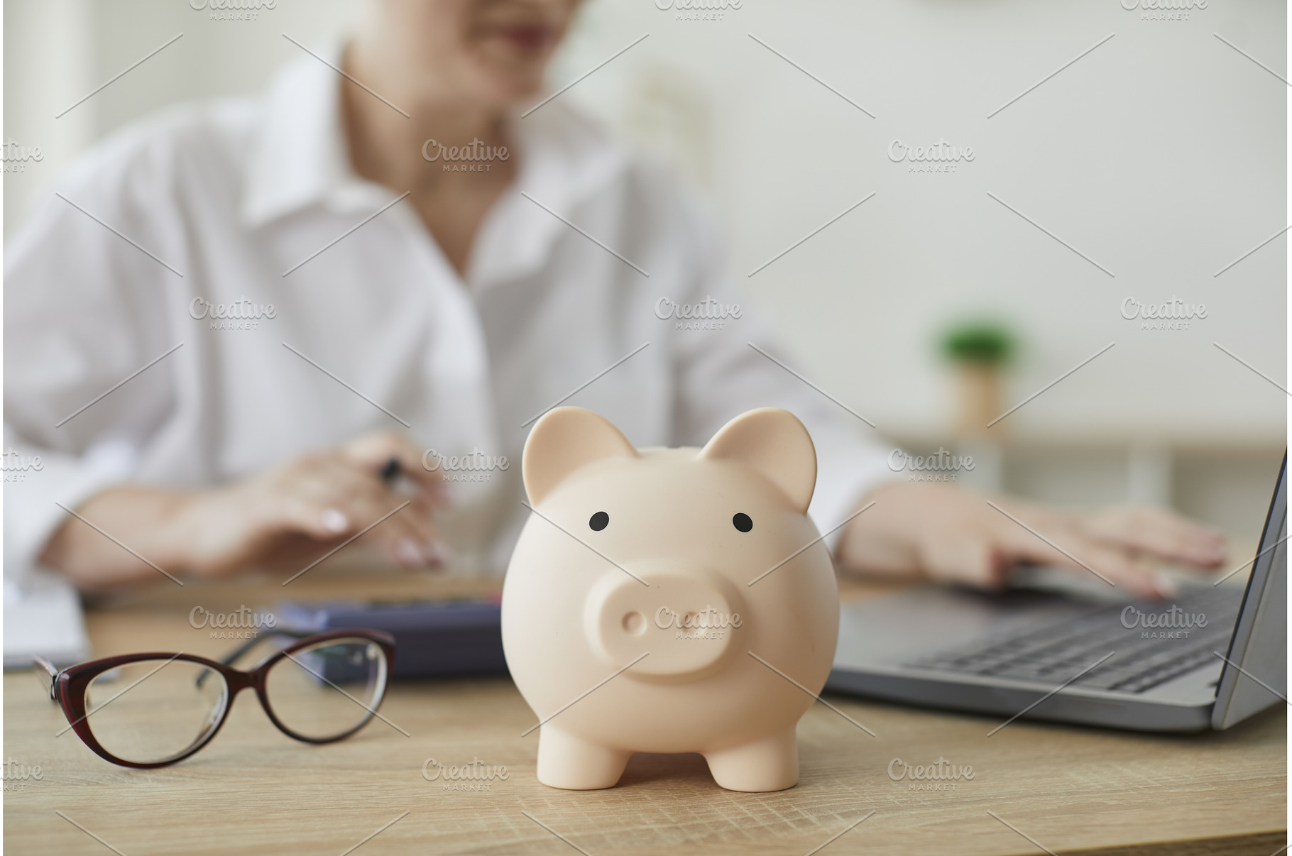 Piggy bank in form of pig on, a Business Photo by StudioRomantic