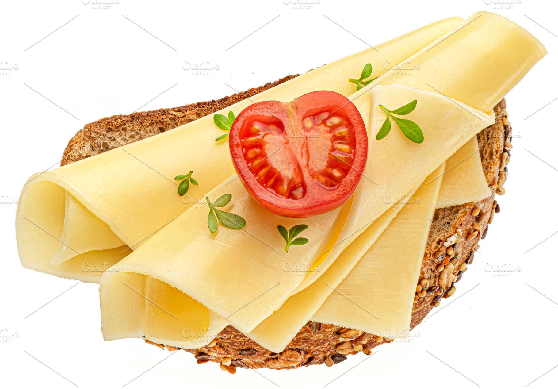 Gouda cheese slices on rye bread, a Food & Drink Photo by Max Lashcheuski