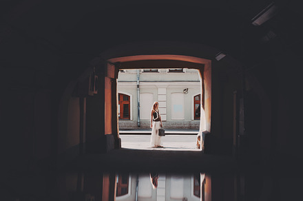 Lady waiting in the end of tunnel, a Person Photo by SkyNext