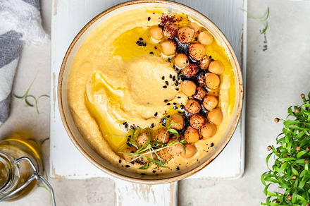 Traditional homemade chickpea hummus, a Food & Drink Photo by Marina_Pronina