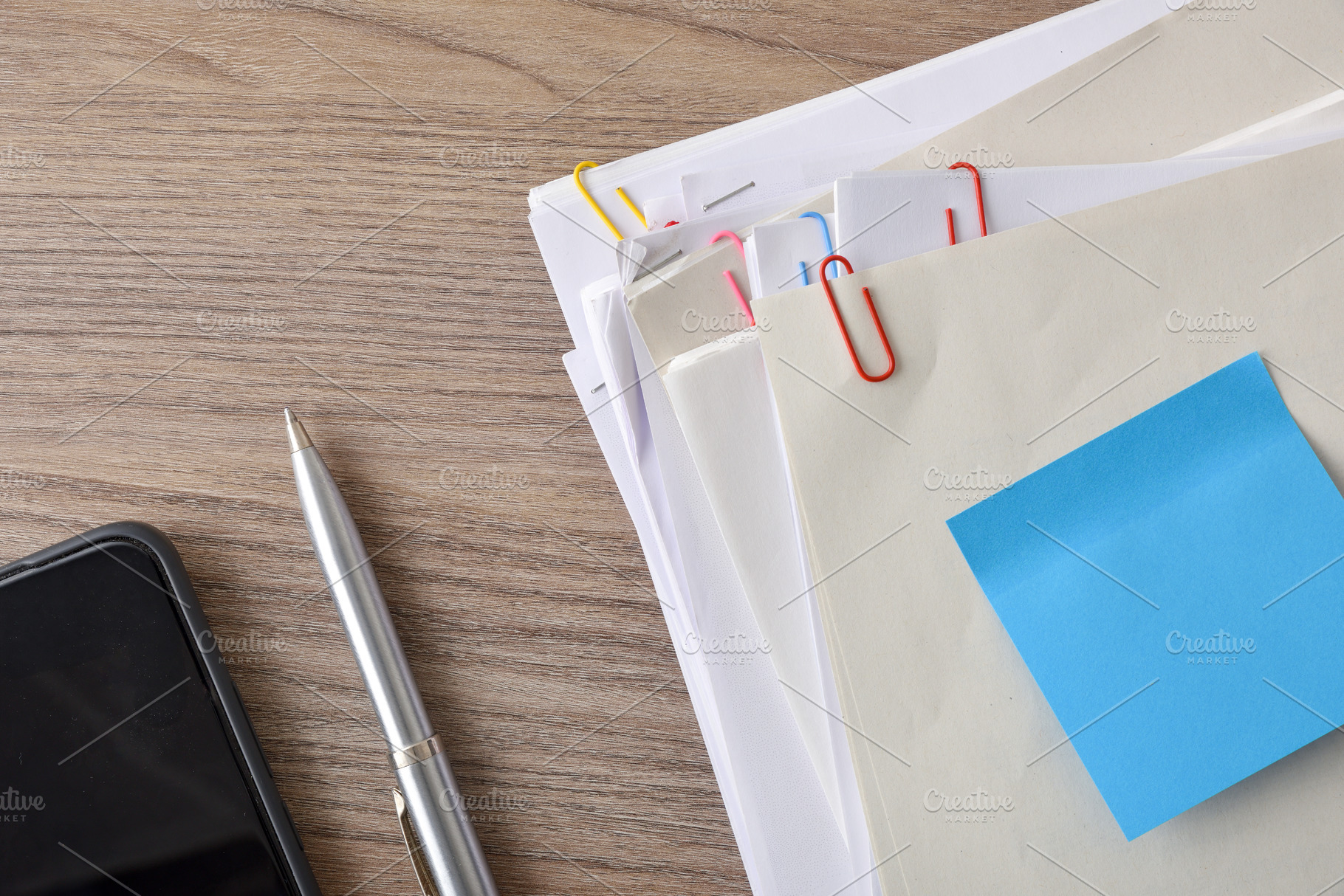 Organized Office Documents with Pen and Sticky Note, a Business Photo by Davizro's Market