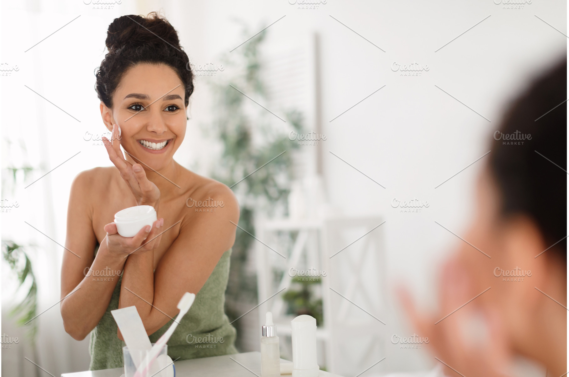 Beautiful millennial woman applying, a Person Photo by Prostock-Studio
