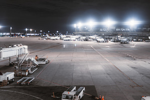 Night airport apron with jets, a Transportation Photo by SkyNext