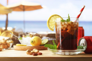 Cola soda on table with appetizers on beach bar, a Food & Drink Photo by Davizro's Market