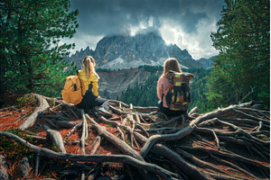 Two young women with backpacks, a Person Photo by den-belitsky