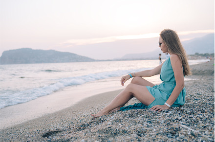 Woman in Flowing Dress on Seaside, a Person Photo by Jan Jack Russo Media