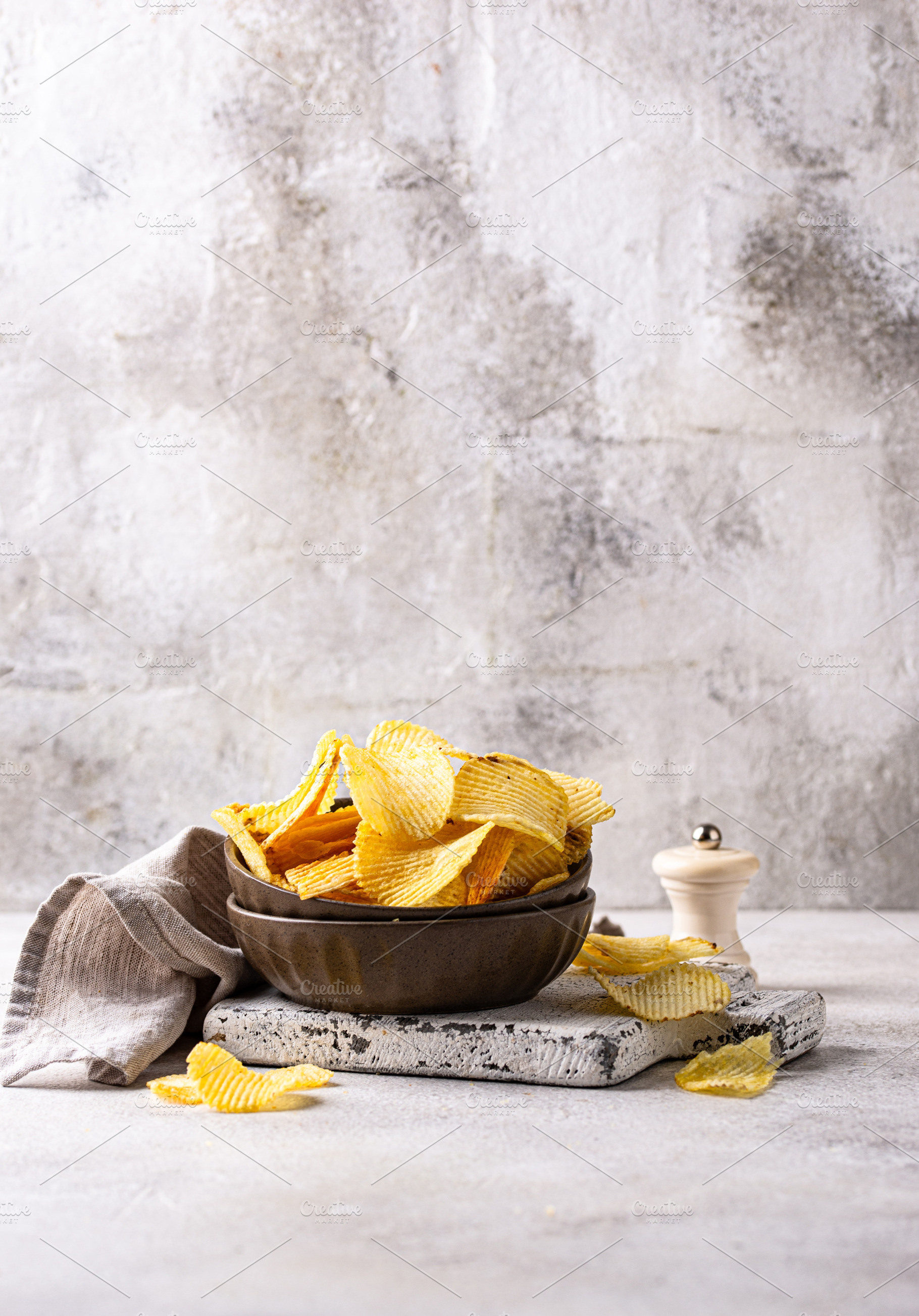 Crispy fresh potato chips, junk food, a Food & Drink Photo by Yulia Furman