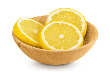 Ripe lemon slices in wooden bowl, a Food & Drink Photo by NataPhoto