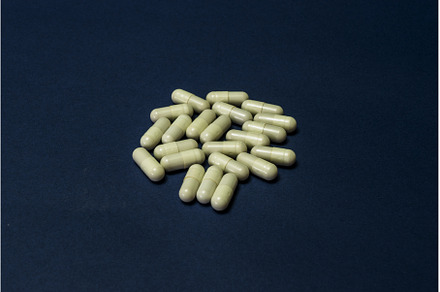 Pills spilled out of white bottle on, a Health & Medical Photo by shahin.mammadov