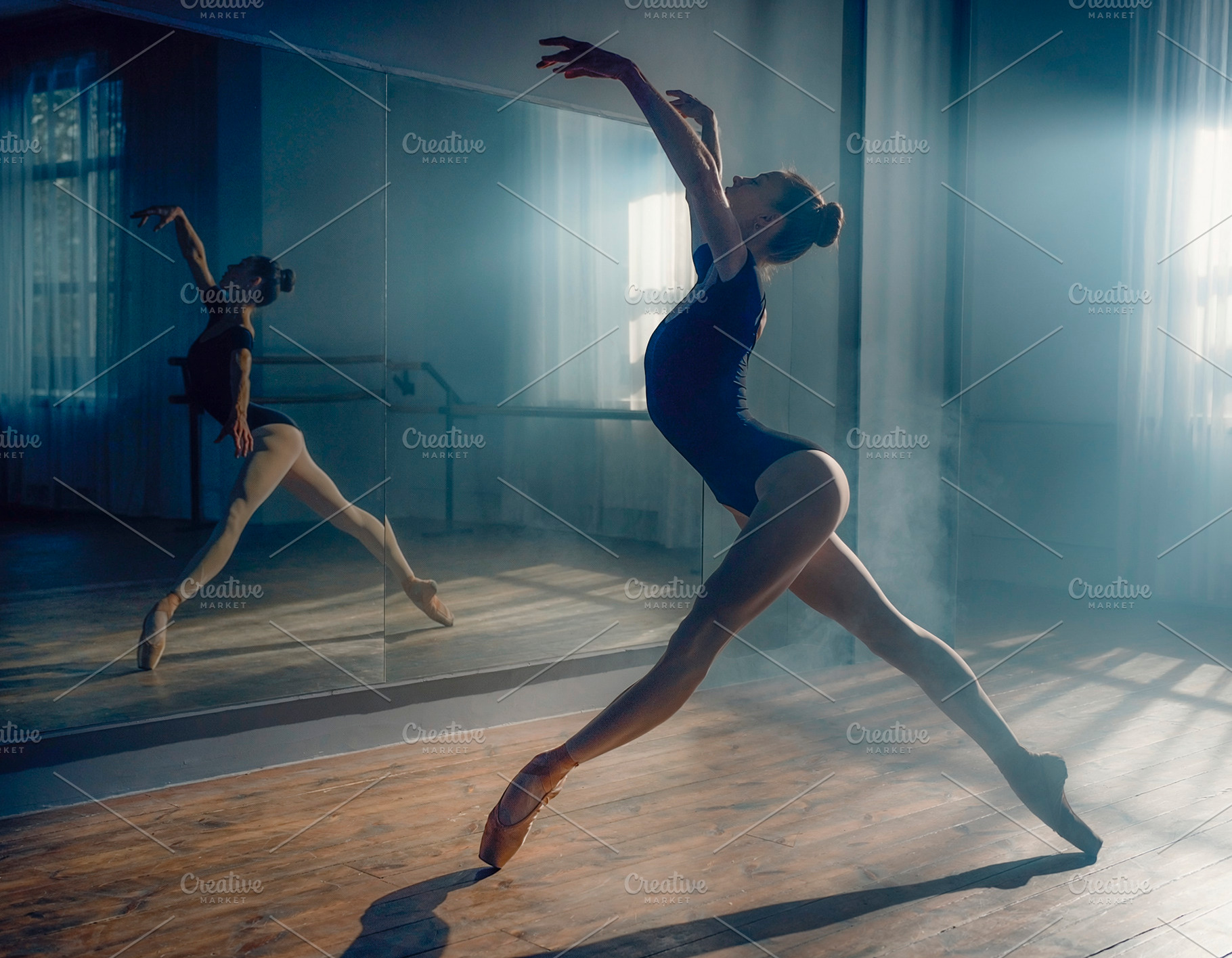 A ballet dancer striking a pose in a, a Person Photo by DanFLCreativo