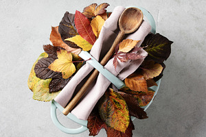 Autumn Kitchen Scene with Blue Pot, Spoon and Leaves, a Food & Drink Photo by Natalia Klenova's Shop