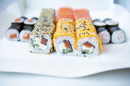 Sushi from Japanese cuisine. There are different types of sushi in the box. Del, a Food & Drink Photo by Artsaba Family