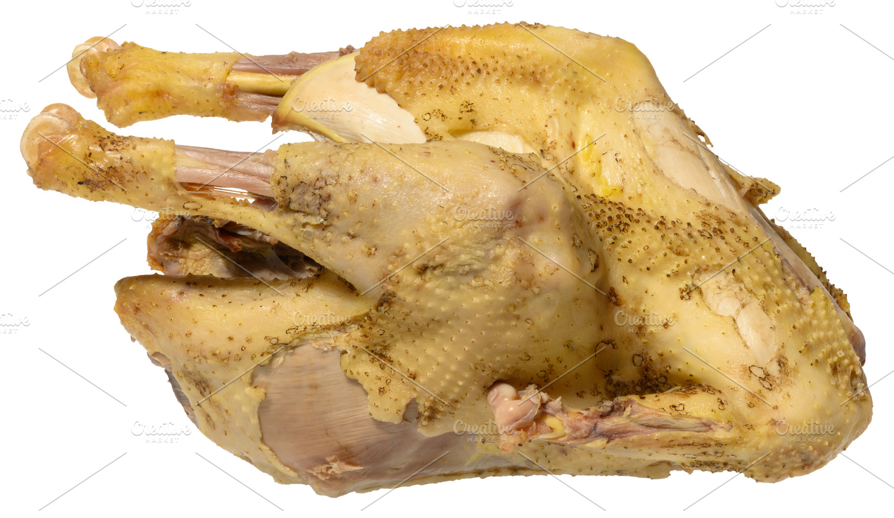 A whole boiled chicken, pale yellow in color,  isolated backgrou, a Food & Drink Photo by ndanko