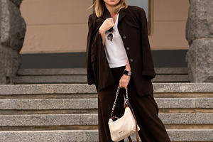 Young woman posing on stone steps, a Person Photo by Elena Vagengeim