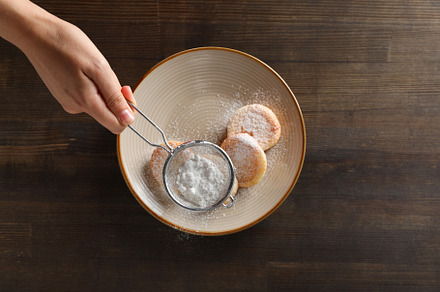 Concept of tasty sweet food, cheese pancakes, top view, a Food & Drink Photo by AtlasStudio PRO