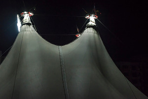 Illuminated circus dome containing circus, tent, and dome
