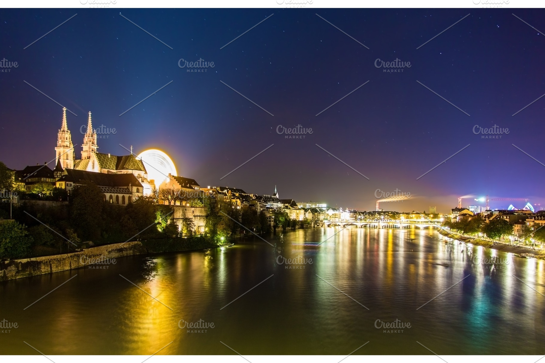 View of Basel over the Rhine by night - Switzerland, an Architecture Photo by Leonid Andronov