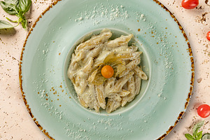 Delicious penne pasta with cheese sauce, a Photo by Grafvision photography