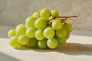 Fresh green grapes on a table, a Photo by Beautiful things