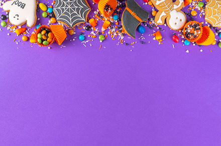 Bright colorful Halloween cookies and sweet background, a Holiday Photo by Rimma