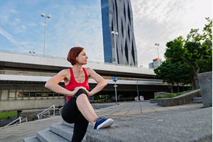 Sporty woman runner preparing for, a Person Photo by HalfPoint