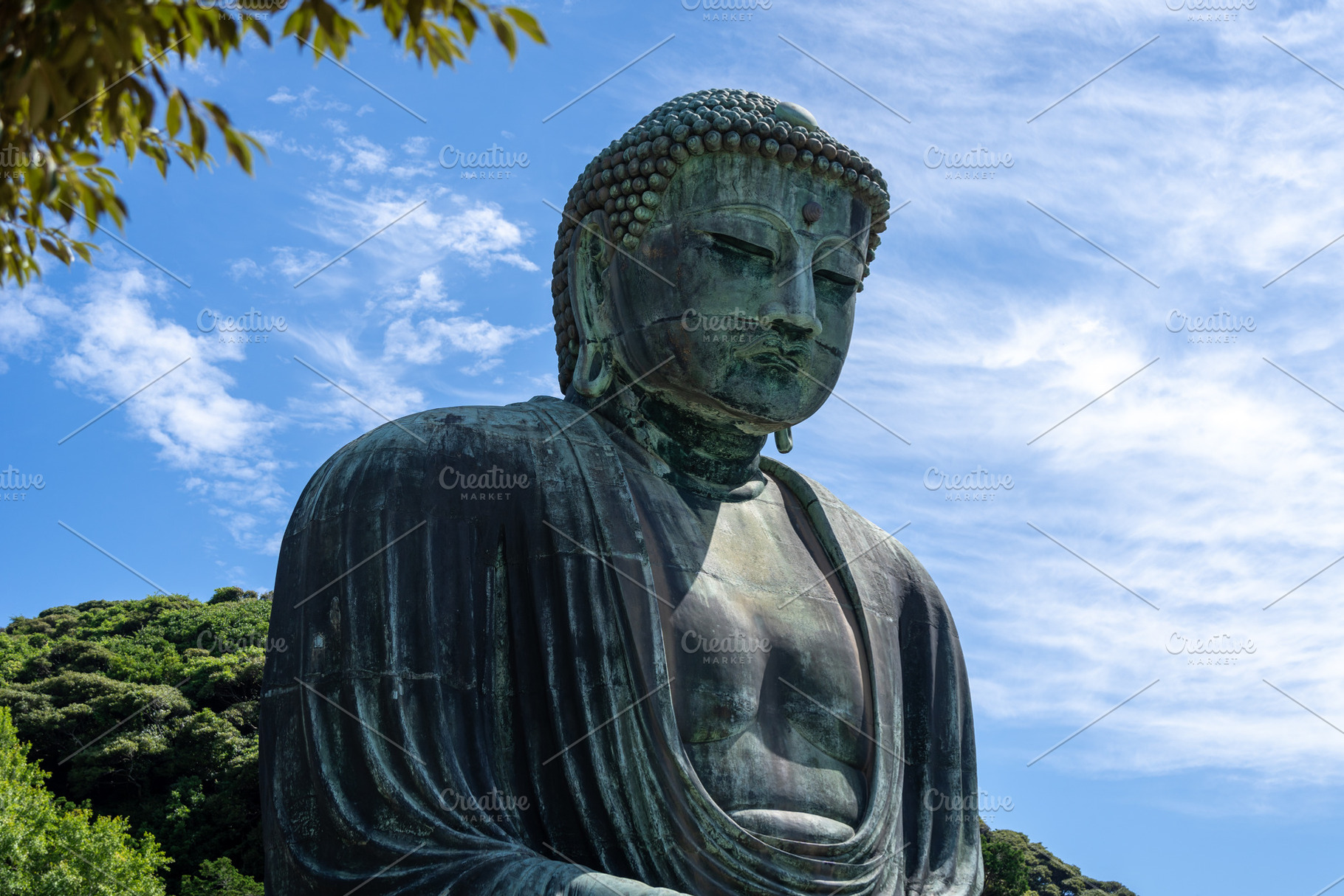 Great Buddha statue close-up view at Kotoku-in temple in Kamakur, an Architecture Photo by GoodGoods