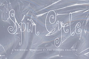 Spin Cycle Spiral Display Font, a Handwritten Font by The October Creative (Thumbnail 1 of 8)