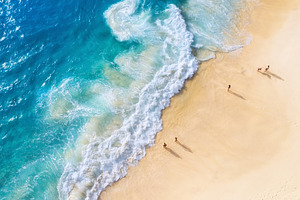 Beach and large ocean waves containing seascape, vacation, and beach