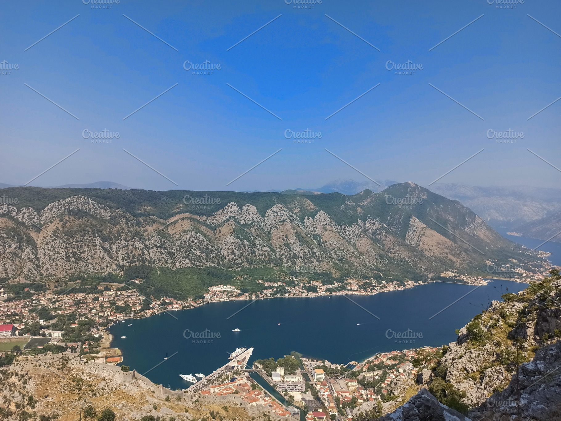 View from above on Kotor bay with se, a Nature Photo by Photo by YuraYaryna
