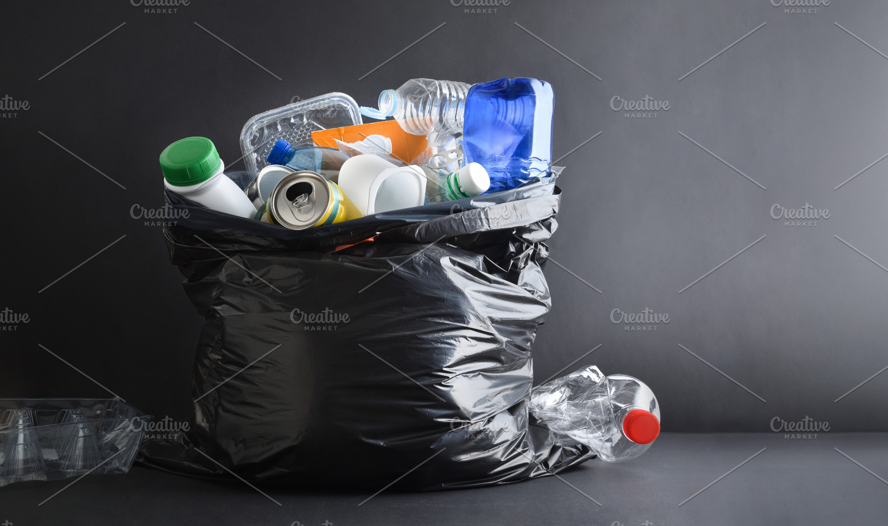 Garbage bag full of general waste on a dark background, a Nature Photo by Davizro's Market