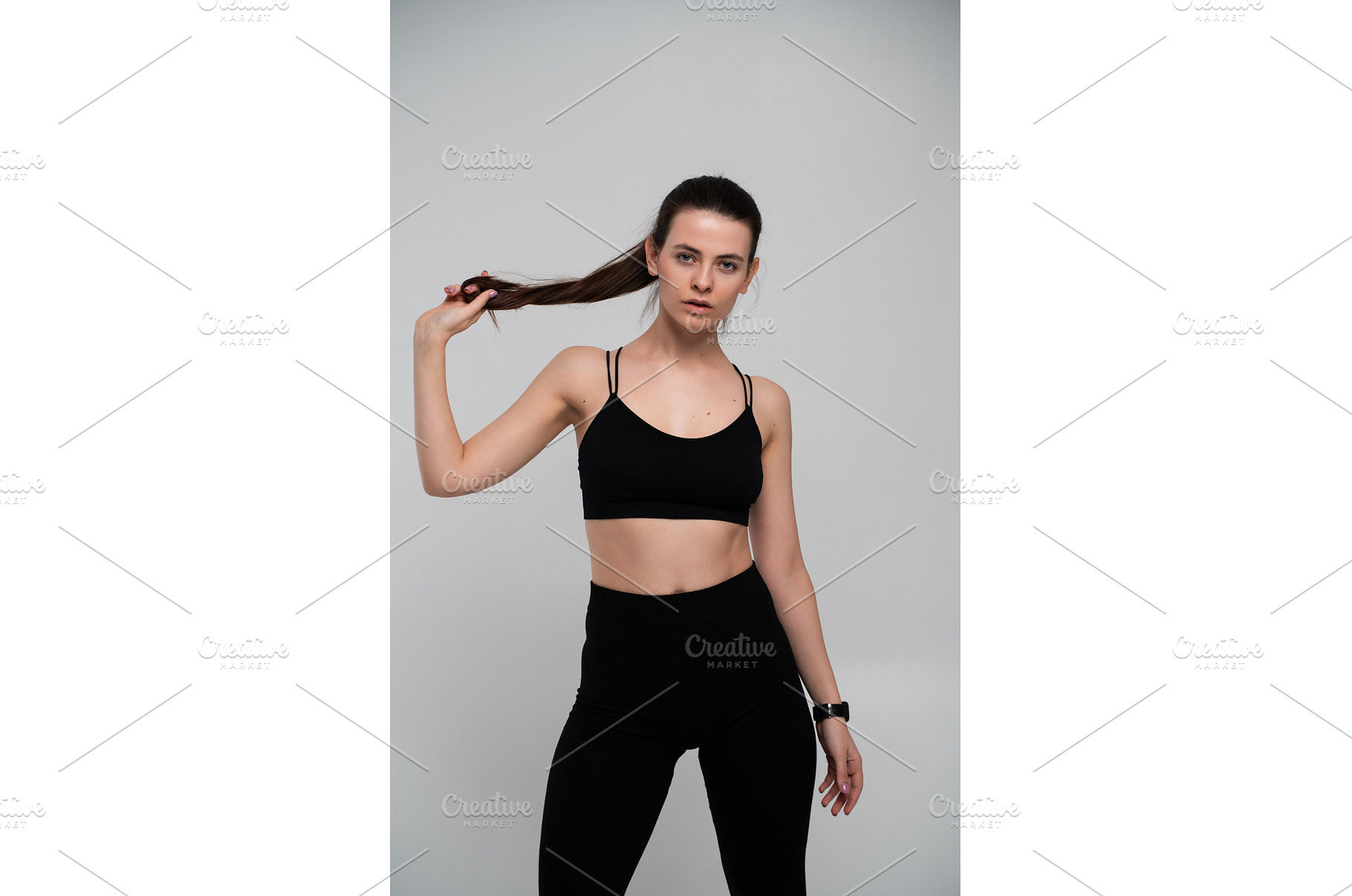 Fit woman in black sportswear, a Sports & Recreation Photo by volodymyrshtun13795