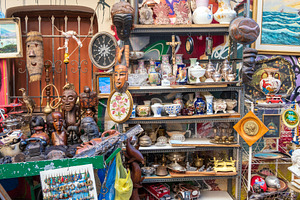 Messy vintage items at a flea market, a Business Photo by BOOCYS