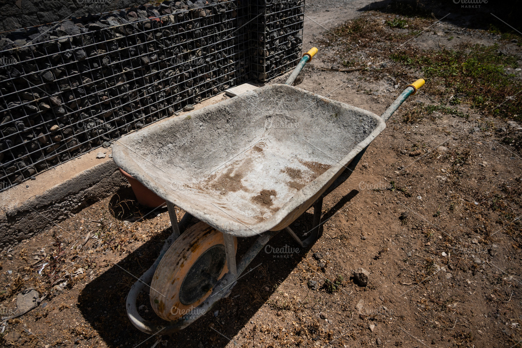 Old Wheelbarrow on Dry Ground, an Industrial Photo by etorres69