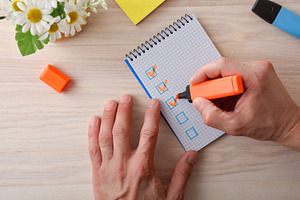 Hand Checking Tasks on Grid Notebook, a Business Photo by Davizro's Market