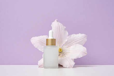 White glass bottle with pipette for cosmetics, oils and serum. A, a Beauty & Fashion Photo by ndanko