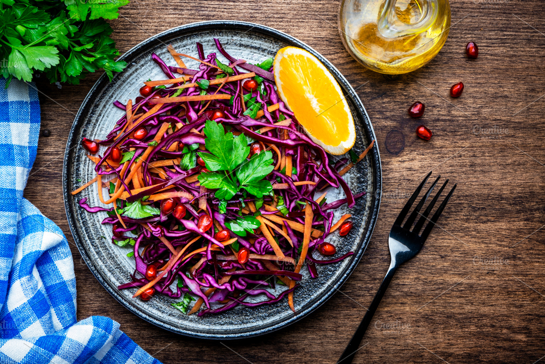 Coleslaw red cabbage salad with carrot, parsley, pomegranate and, a Food & Drink Photo by 5PH