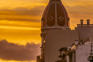 City  buildings silhouette at sunset, an Architecture Photo by DanFLCreativo