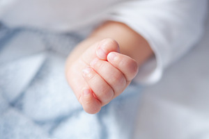 Baby Little Hand Styled Stock Photo