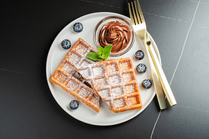 Belgium waffles Homemade waffles with strawberries, a Food & Drink Photo by Budarinphoto