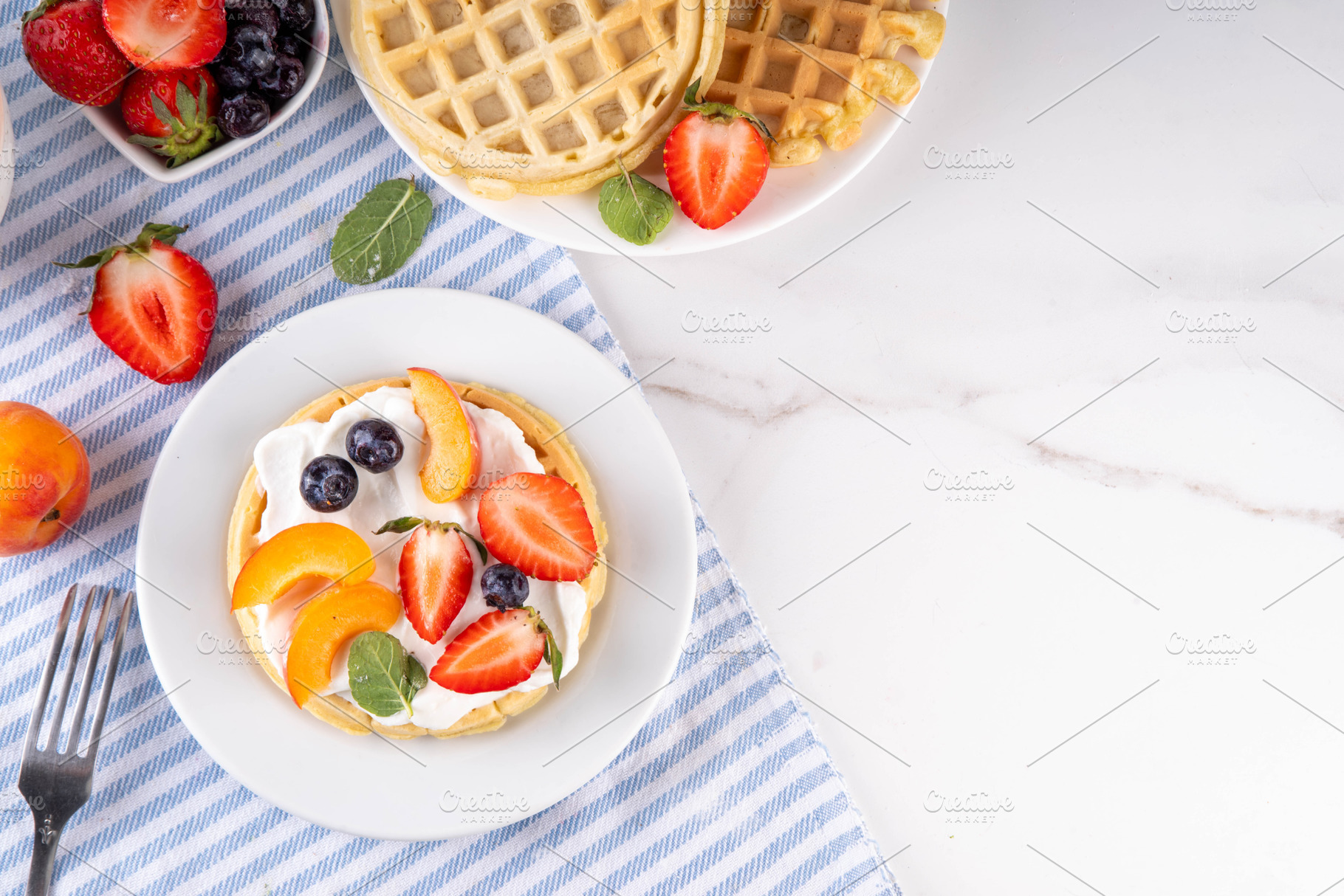 Stack of belgian waffles yogurt, fresh fruits and berry for brea, a Food & Drink Photo by Rimma