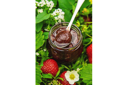 Homemade strawberry jam in a jar, a Food & Drink Photo by yanadjana