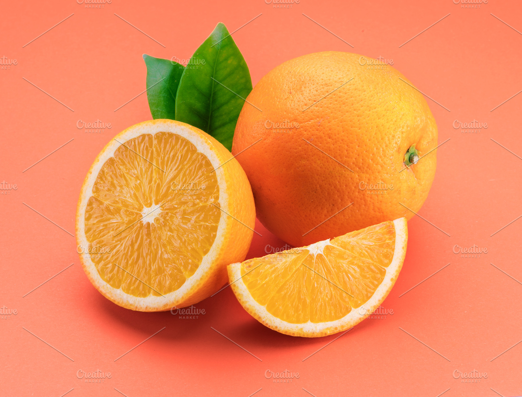 Orange fruit with orange slices, a Food & Drink Photo by Volff