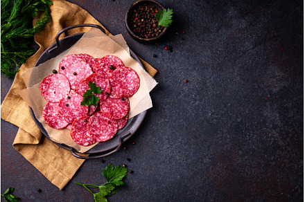 Sliced spicy tasty salami sausage