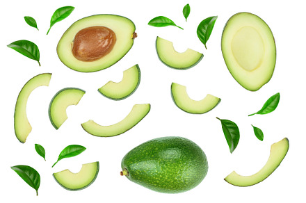 Avocado and slices decorated with containing avocado, isolated, and green, a Food & Drink Photo by NataPhoto